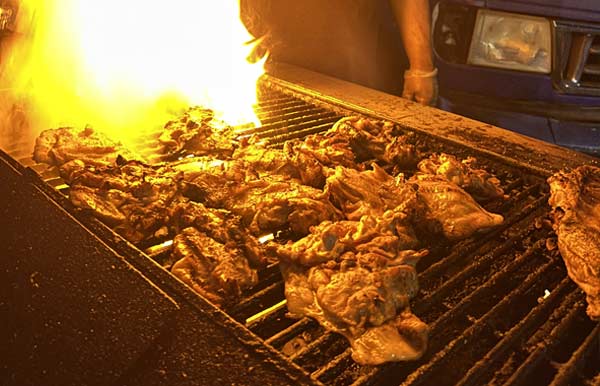 Real food cooking over flames